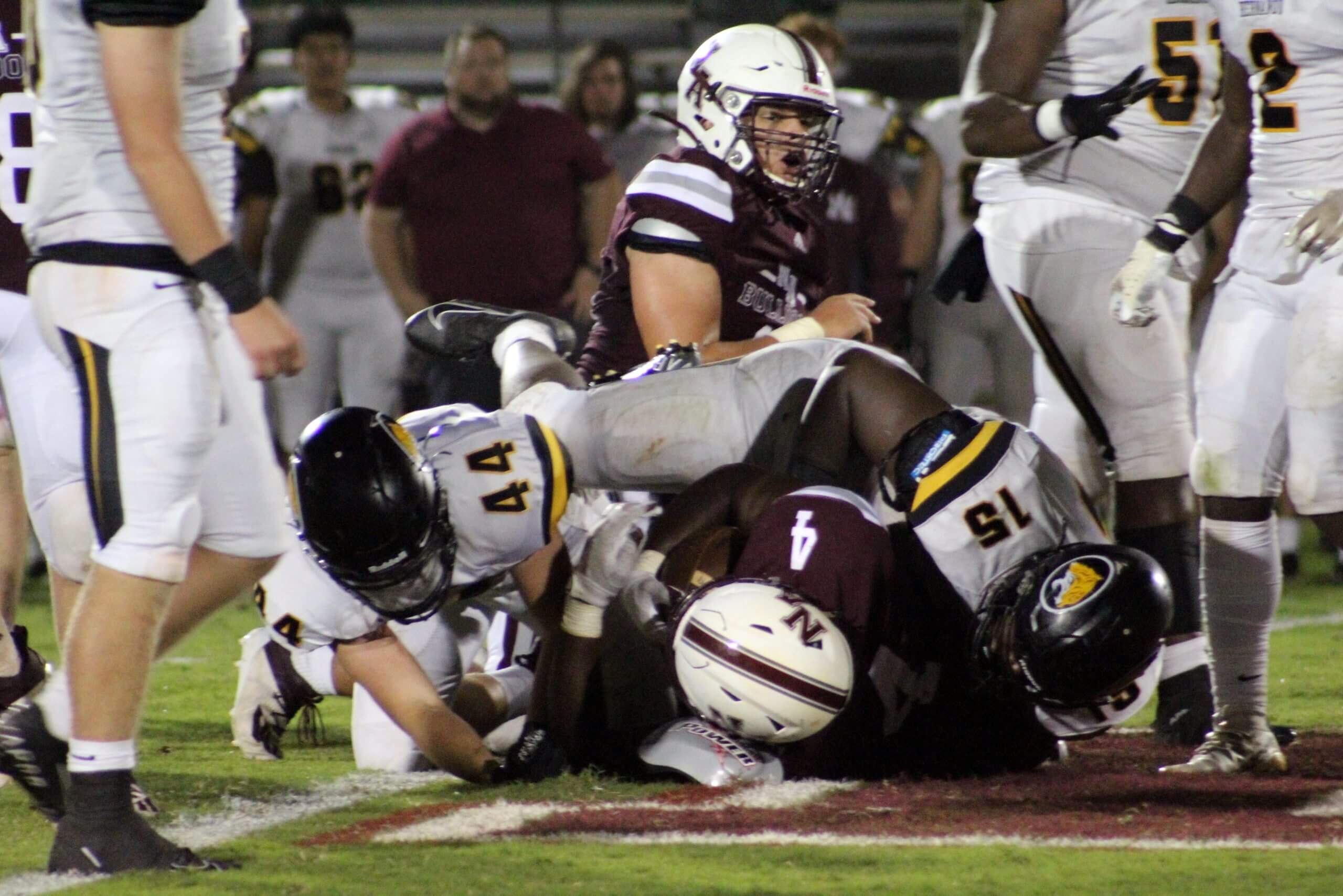 Prep football: Tigers claw past Bulldogs in high-scoring affair