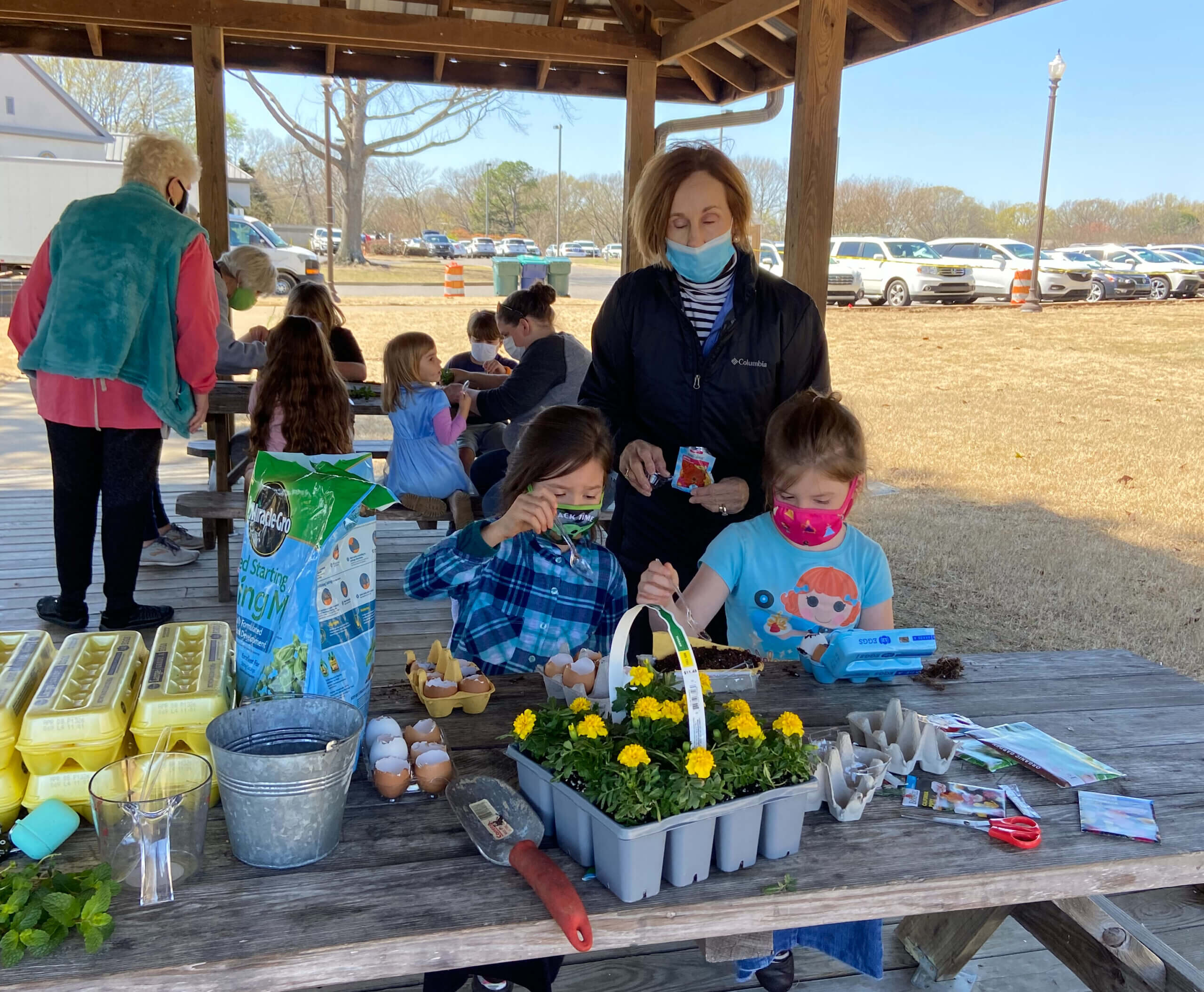 Garden Club helps library in spring planting activities