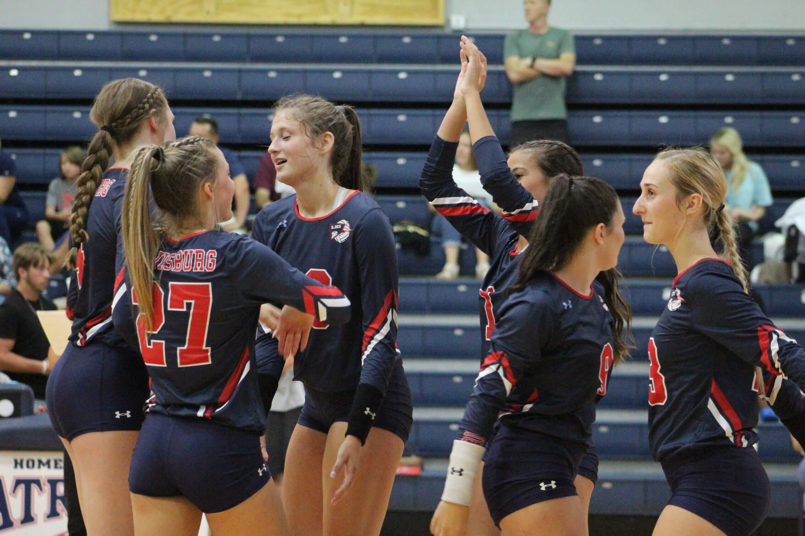 Volleyball teams hold court in Tuesday action