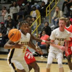 Tigers battle Cougars in Monday basketball