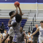 Northpoint splits basketball twinbill before holiday break