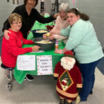 Garden club helps "Cookies With Santa"