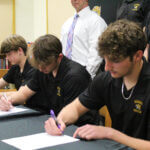 Tiger soccer trio to play in college