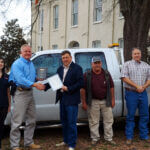 Caldwell presents vehicle to Carroll County for litter removal