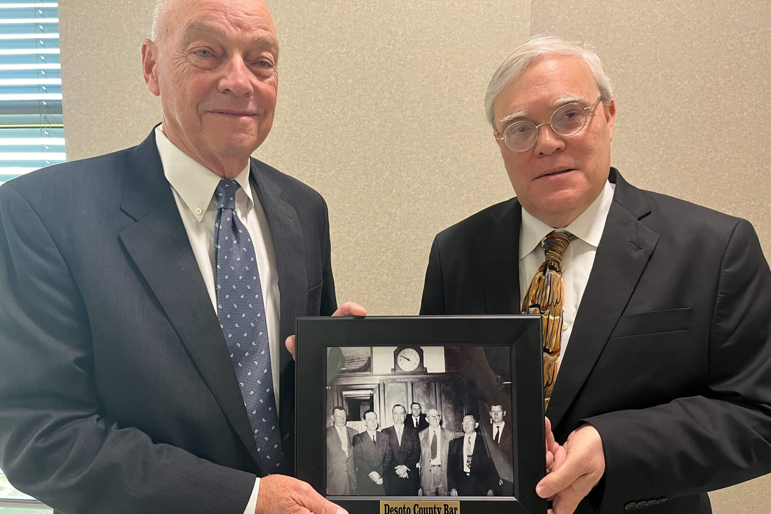Museum presents historic photograph to county courthouse DeSoto