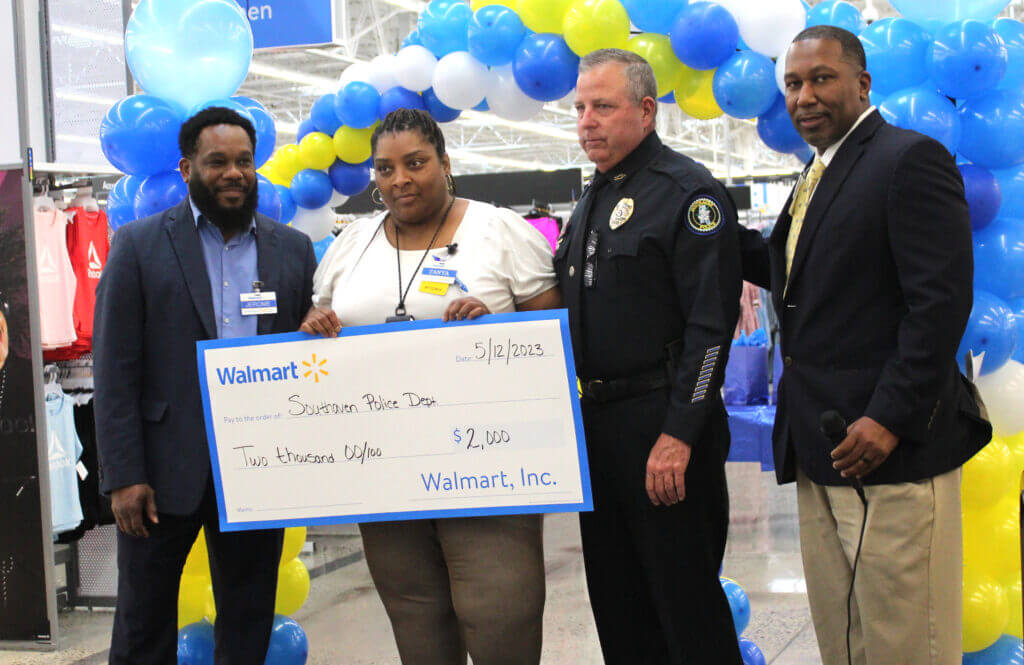 Walmart awards Memphis Team USA with check