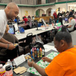 Wright greets Jackpot Bingo players during Olive Branch visit
