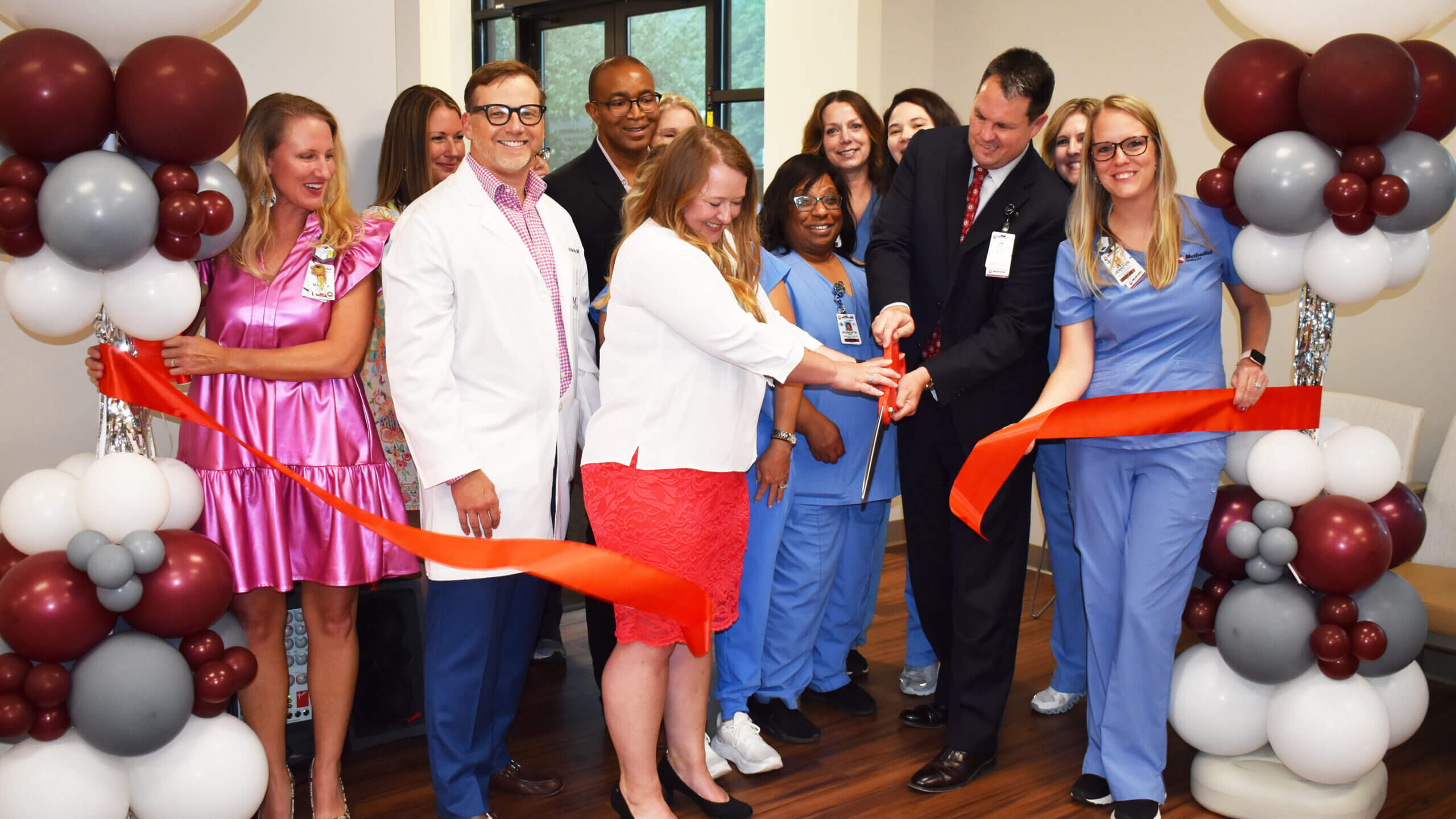 Le Bonheur ribbon cutting