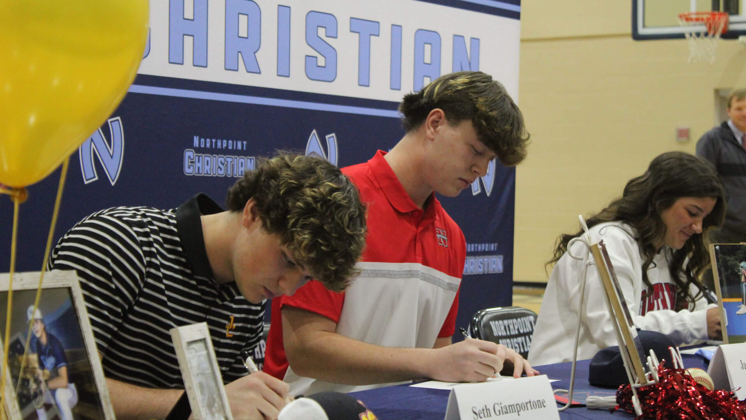Tuesday sports Trio of Trojans sign baseball, volleyball commitments