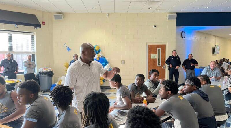 Tuggle speaks on leadership at Olive Branch “Doughnuts with Dads” event