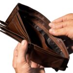 Harris: Reducing Old Debt in the New Year empty wallet