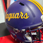 Jaguars celebrate seniors set to play college football Jaguars football helmet featured