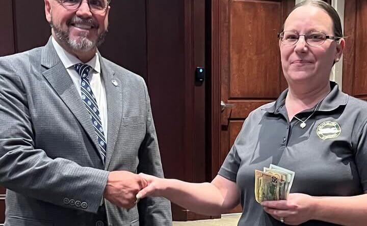 Olive Branch meter reader honored after saving colleague Ken Adams, Olive Branch Mayor and the Board of Aldermen recognized Meter Reader Supervisor, Sherrie