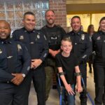 Olive Branch officers attend fifth-grade graduation for Elijah Cummins Photos from Olive Branch Police Department's post