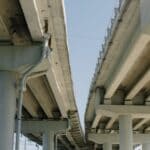 Craft Road Bridge Over U.S. 78 Set to Reopen Monday Concrete highway overpass and support pillars under a blue sky, illustrating the Craft Road bridge reopening
