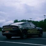 DeSoto Sheriff's Captain Stephen Raines Retires After 27 Years Sheriff patrol car on the road, illustrating Stephen Raines retires from DeSoto County Sheriff's Office