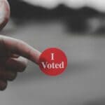Watson: Voter registration deadline Oct. 5; absentee voting changes for Nov. 3 general Hand holding a red I Voted sticker