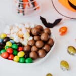 The 5 Best Halloween Candy Packs for DeSoto County Trick-or-Treaters A bowl overflowing with colorful wrapped Halloween candy, ready for DeSoto County trick-or-treaters.