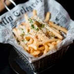 The 5 Best Air Fryers for Busy Families in DeSoto County Crispy air-fried potato wedges served on a wooden cutting board