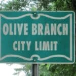 Former Cascades Developer Arrested in Olive Branch Olive Branch city limit sign, illustrating the Cascades developer arrested in Olive Branch
