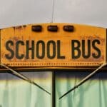 DeSoto County Schools Fall Break Runs Oct. 5-9 Close-up of a yellow school bus sign, illustrating DeSoto County Schools fall break