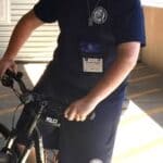 DeSoto County Sheriff's Office Mourns Volunteer Chandler Magee Chandler Magee in a DeSoto County Sheriff's Office cadet uniform beside a police bicycle, honored as a DeSoto County Sheriff's Office volunteer
