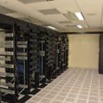 Southaven Data Center Roundtable Airs Noise, Buyout Concerns Rows of server racks inside a data center, illustrating the Southaven data center roundtable story